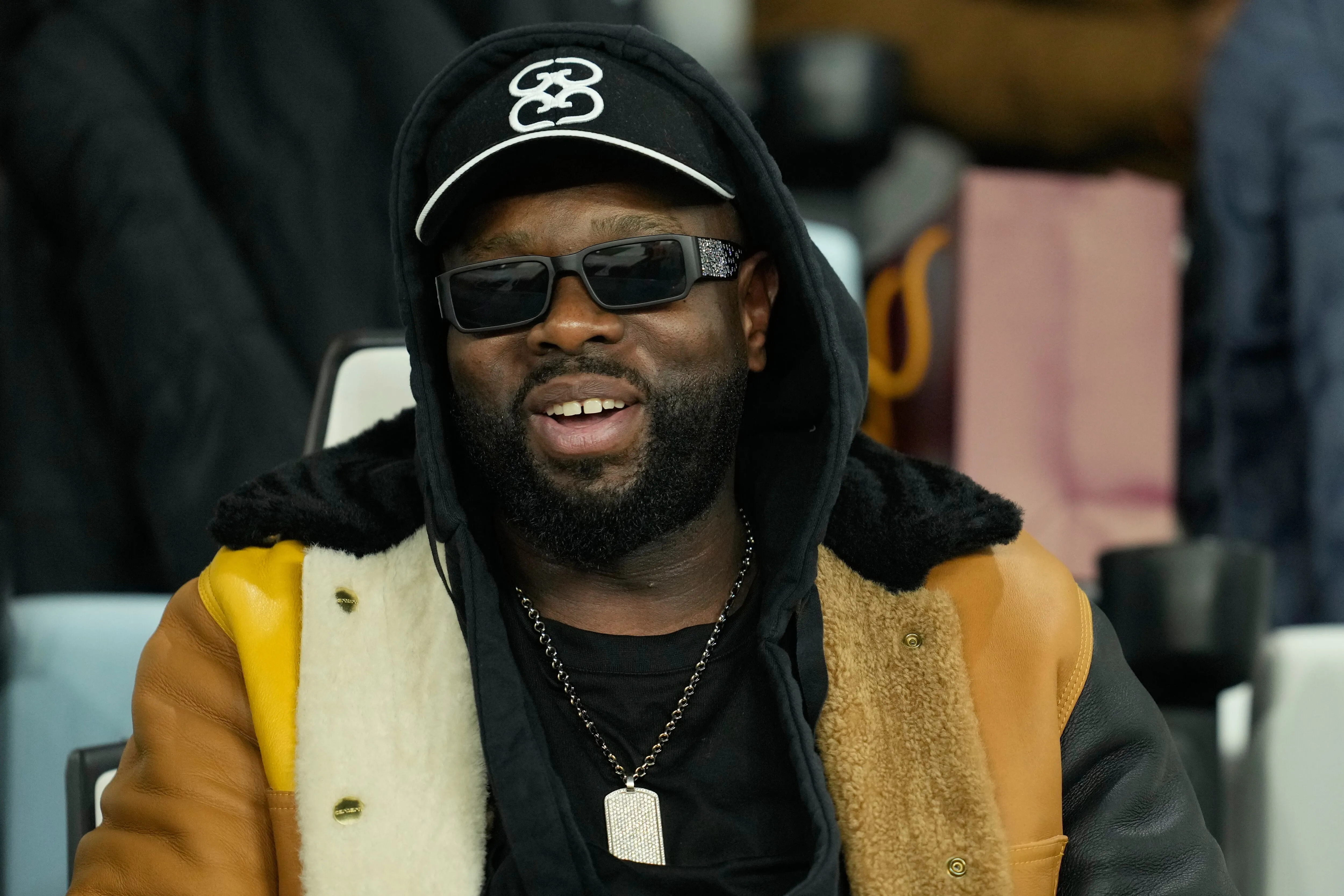 Gims, Renowned Congolese Rapper, Faces Arrest on Money Laundering Charges in France