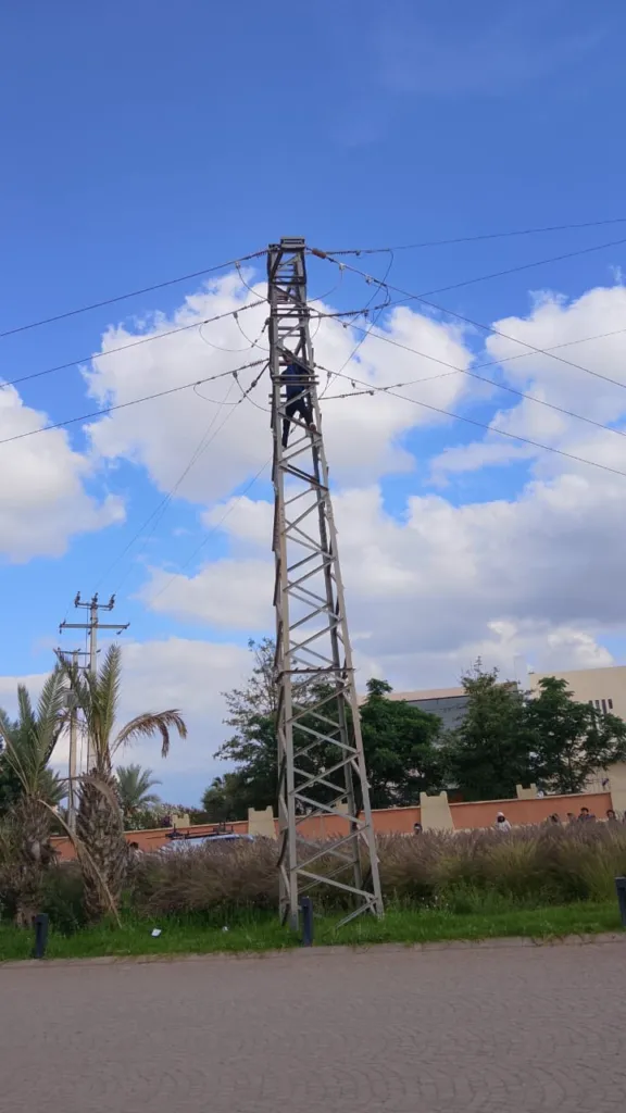 Emergency Response in Marrakech: Individual Threatens Suicide from Electric Tower