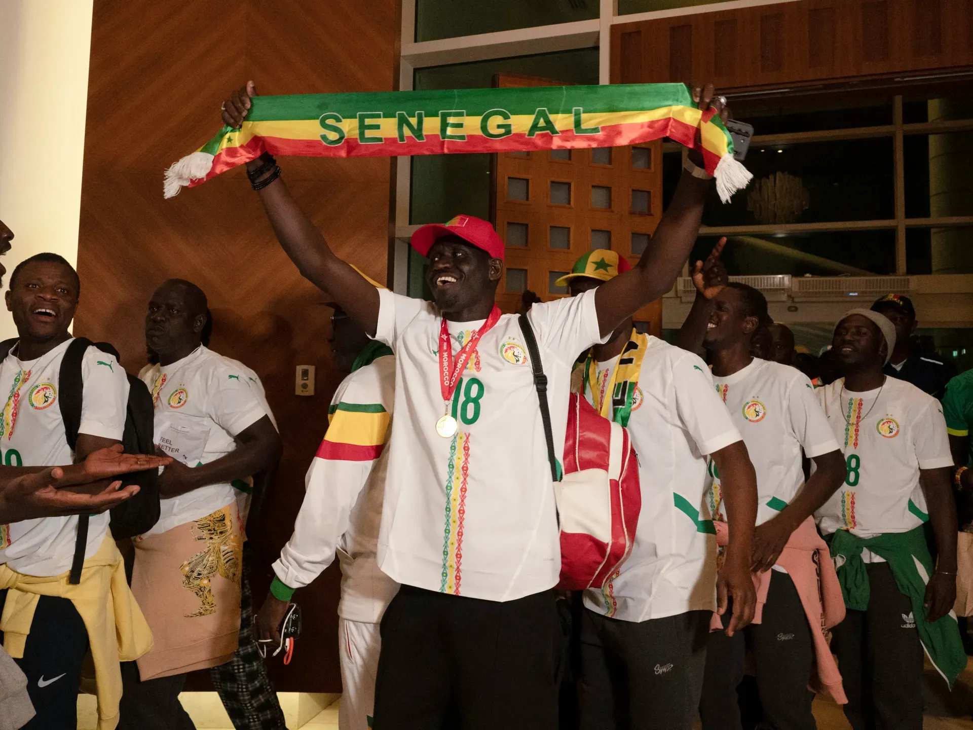 Senegalese Football Fans Return Home After Royal Pardon from Morocco