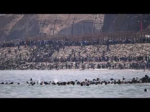 Massive Influx of Migrants Storms Ceuta Border from Morocco