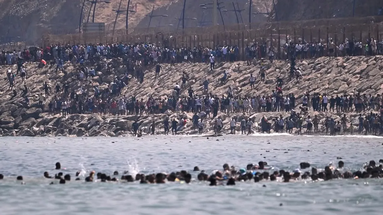 Surge of Migrants in Ceuta Triggers Military Deployment from Spain