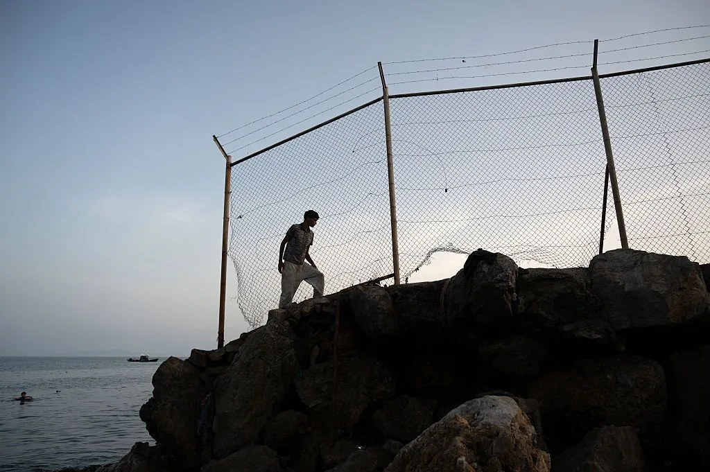 Spain Faces Migrant Crisis at Ceuta: Political Fallout and International Reactions