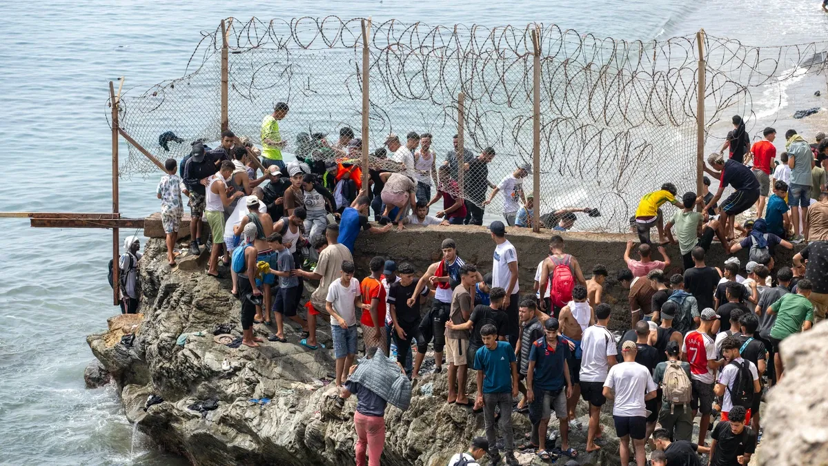 Morocco Addresses Migrant Surge at Ceuta: Miscommunication and Speculations Unveiled