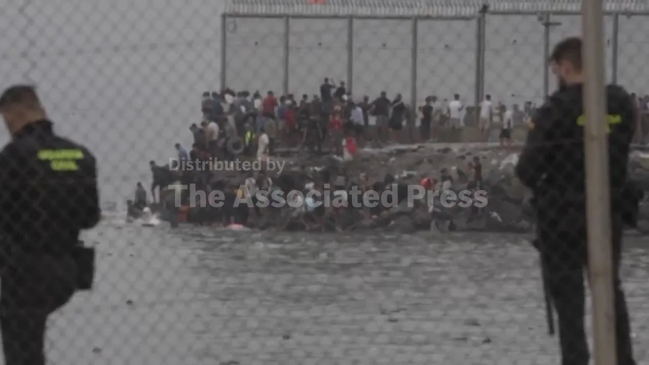 Ceuta's Border Crisis: Thousands of Migrants Pour In Amid Chaos