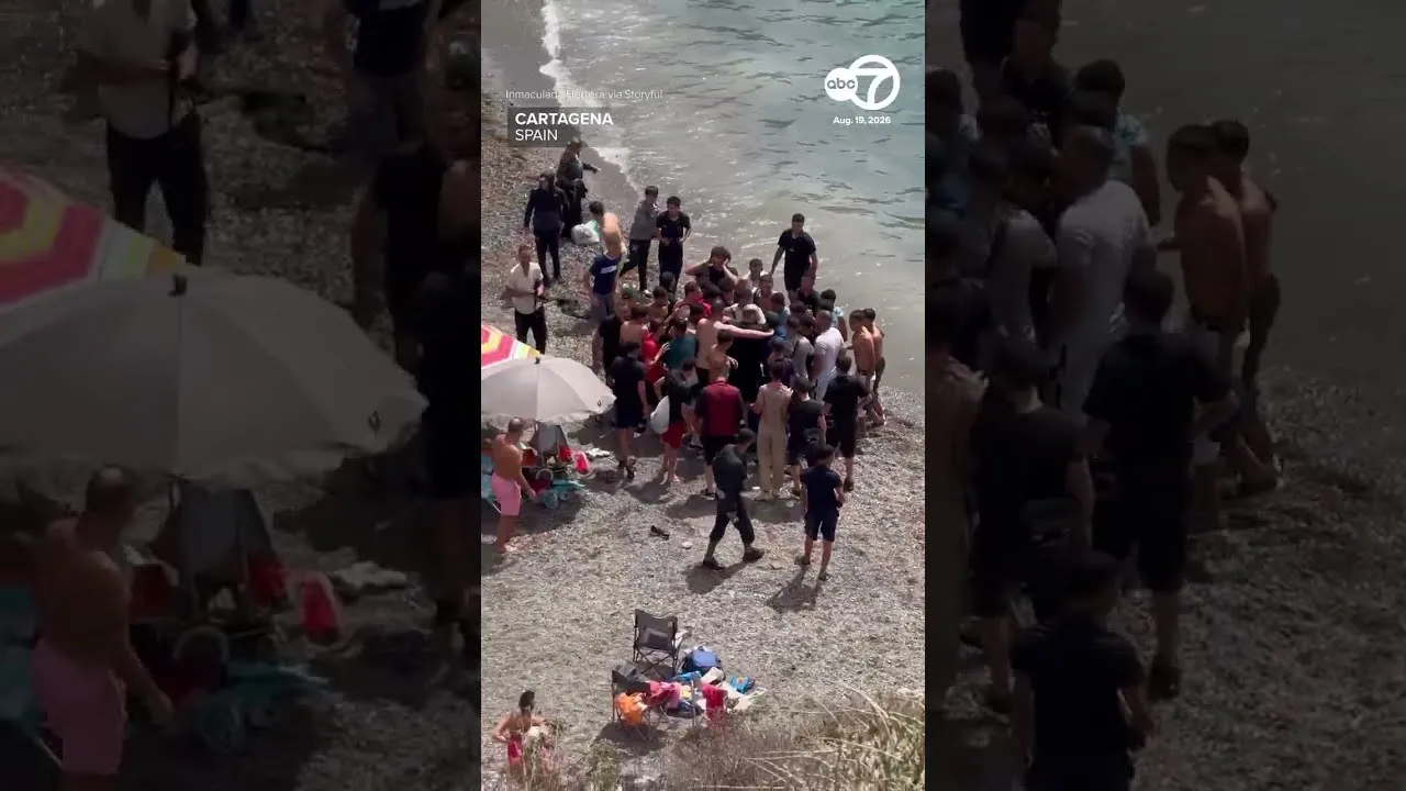 Tourists Evacuate as Migrant Boat Arrives on Spanish Shore
