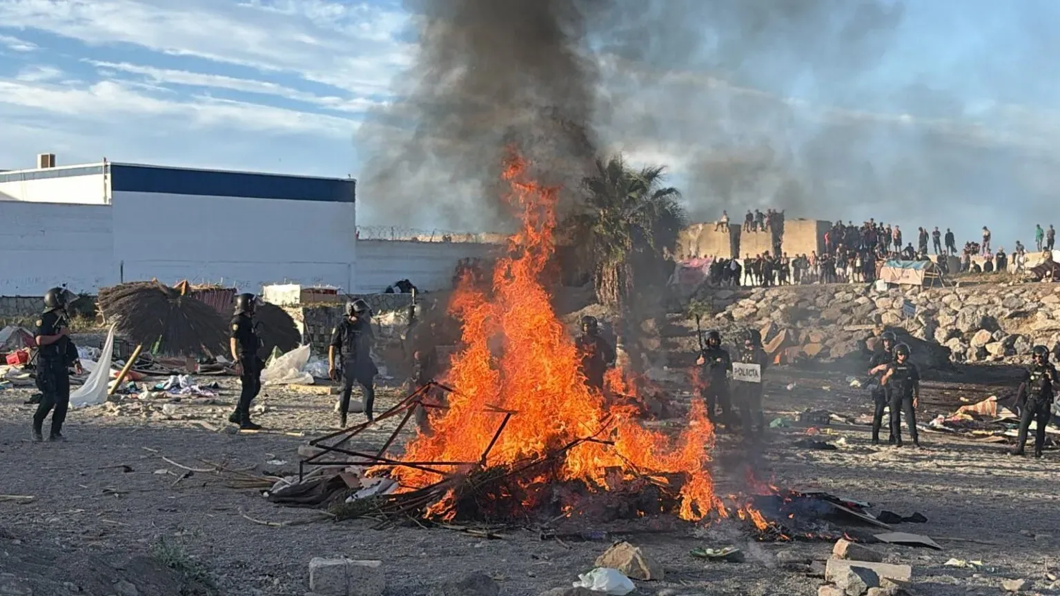 Tensions Rise in Ceuta: Protesters Attack Migrants and Burn Tents