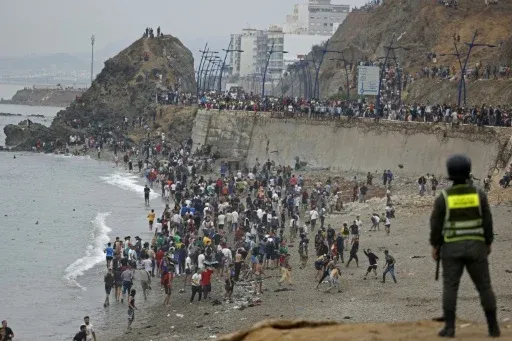 Moroccan Security Forces Criticized for Inaction During Migrant Surge in Ceuta