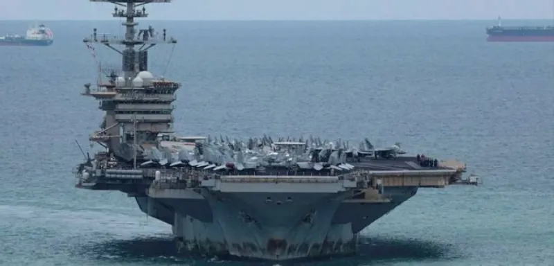 Tensions Rise as Trump Threatens Strikes on Iran Amidst Military Maneuvers
