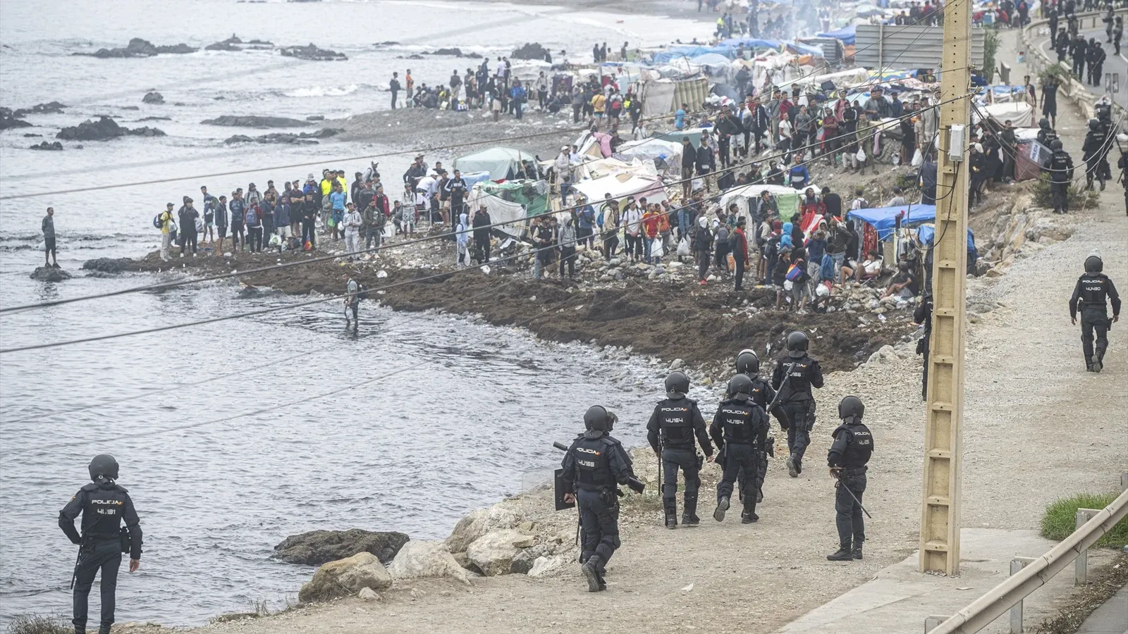 Ceuta Crisis: Over 1,100 Migrants Successfully Relocated Amidst Adverse Weather Conditions