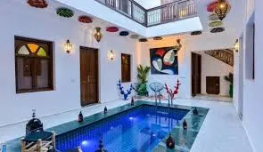 Police Raid Uncovers Prostitution and Drug Use in Marrakech Villa