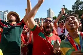 Celebration of Soccer: Morocco and Brazil Fans Unite at World Cup Fan Fest