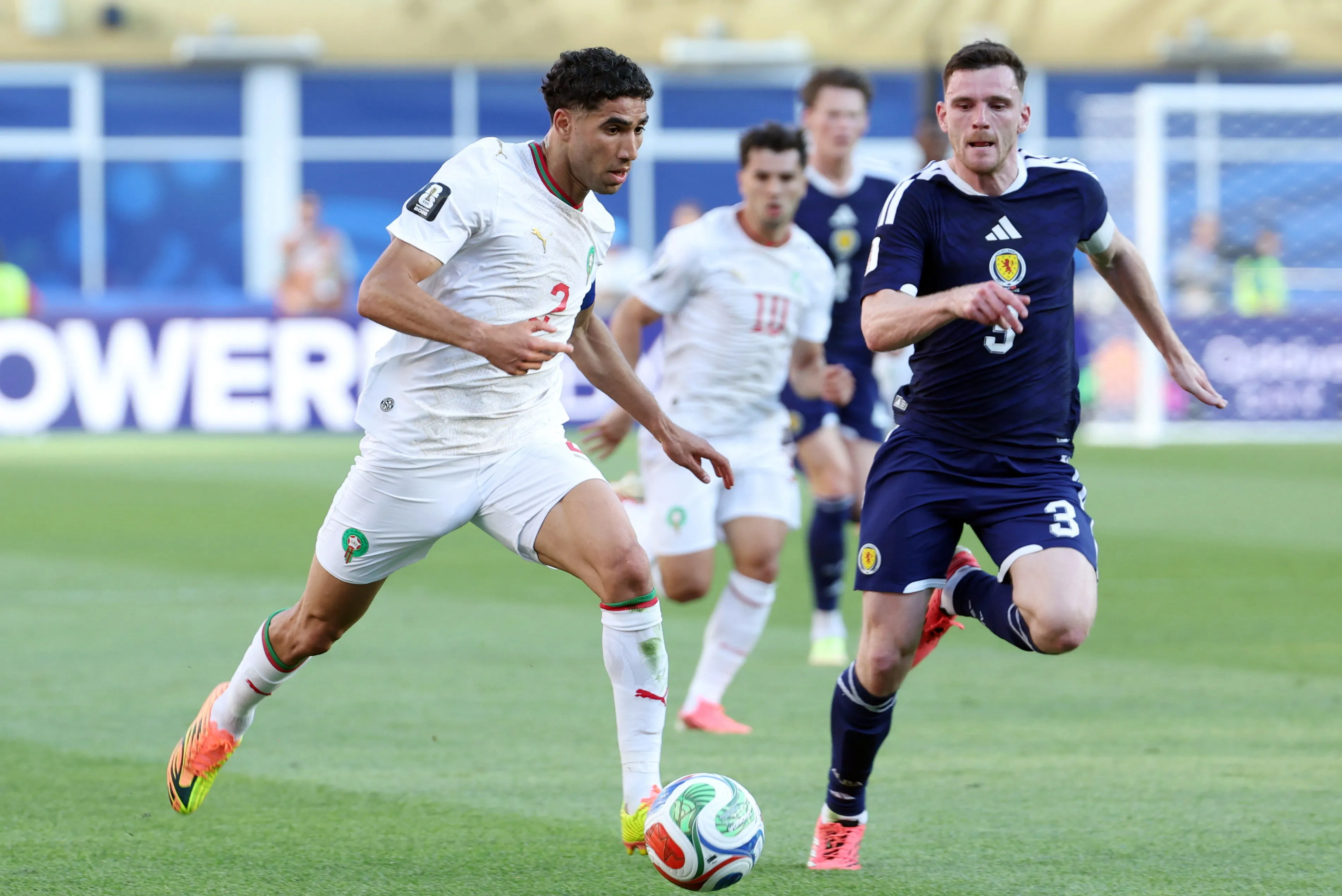 Morocco's Coach Expresses Satisfaction After Victory Over Scotland, Highlights Team Spirit Behind Achraf Hakimi