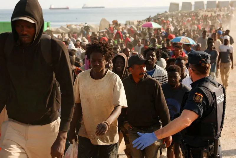 Spain Seeks EU Assistance to Manage Migrant Crisis in Ceuta